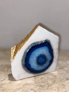 Agate natural gemstone eye shape on white marble - free standing - used as evil eye